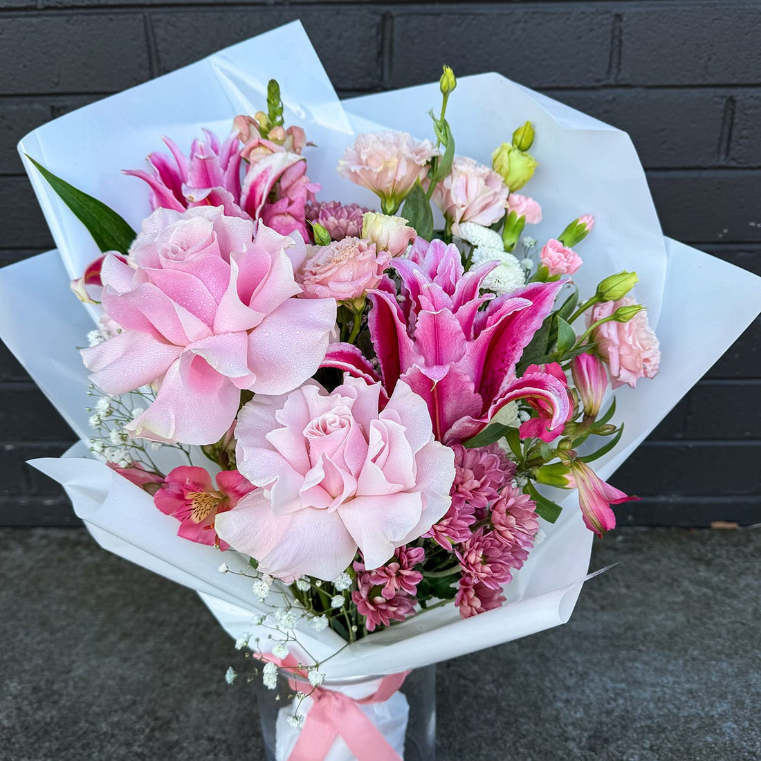 Spoil your Valentine with our Blushing Belle Bouquet! A gorgeous mix of pink garden roses, lilies, and carnations. Order for local delivery in St Albans.