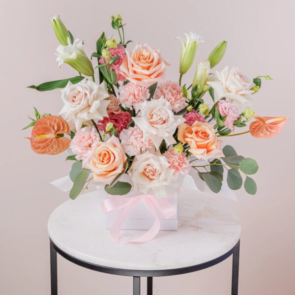 Blushing Beauty Hatbox with Roses, Rose Lilies & Carnations