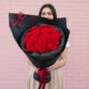 Crimson Noir Bouquet 2 Make a bold statement this Valentine's Day with our Crimson Noir Bouquet. Stunning red roses in a chic black wrap. Order for delivery in St Albans!