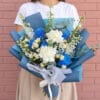 The perfect unique Valentine's gift! Our Sapphire Skies Bouquet is a stunning mix of blue chrysanthemums & white roses. Order for delivery in St Albans.